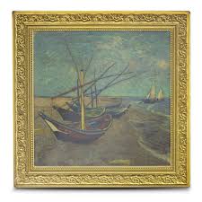Gold-framed painting of fishing boats on a sandy shore, some in water, under a cloudy sky.